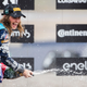 A photo of Catie Munnings on the podium at an Extreme E race